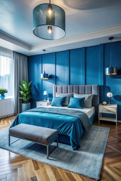 a bedroom with blue walls and wooden floors