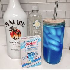 the ingredients needed to make an ice cream smoothie are displayed on a counter top