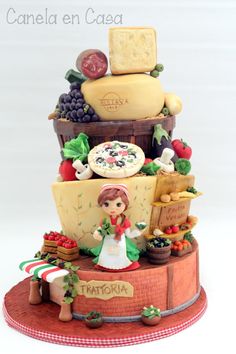 a cake made to look like it has cheese and other foods on top of it