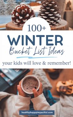 a person holding a cup of hot chocolate in their hands with the words winter bucket list ideas