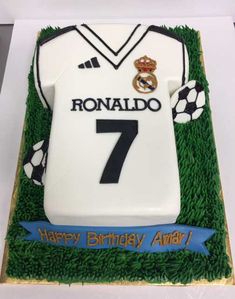 a birthday cake made to look like a soccer jersey