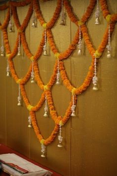 orange and white garlands hanging on the wall