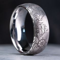 a wedding ring with an intricate design on it