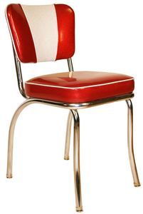 a red and white chair sitting on top of a metal frame