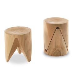 two wooden stools sitting next to each other