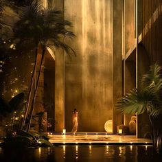 a woman is standing in the middle of a pool surrounded by palm trees and lights