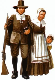 an image of a man and woman dressed in old fashioned clothing with two young children