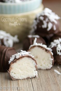 coconut cream truffles are cut in half and stacked on top of each other