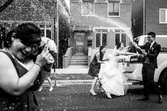 the bride and groom are throwing confetti at each other