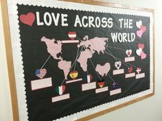 a bulletin board with hearts and flags on it that says, love across the world