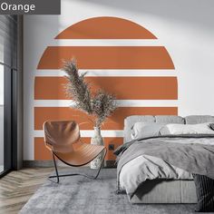 an orange and white striped wall in a bedroom with a chair next to the bed