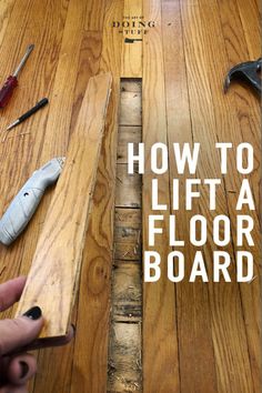 a person is working on wood flooring with the words how to lift a floor board