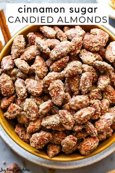 cinnamon sugar candied almonds in a yellow bowl