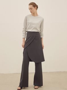 Elegant Asymmetrical Hem Work Pants, Chic Asymmetrical Hem Bottoms For Work, Asymmetrical Bottoms For Workwear In Fall, Chic Asymmetrical Hem Bottoms For Fall, Chic Bottoms With Asymmetrical Hem For Fall, Asymmetrical Hem Pants For Fall Workwear, Versatile Workwear Bottoms With Asymmetrical Hem, Versatile Long Skirt For Work, Wrap Skirt Pants