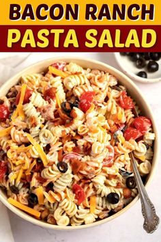 this bacon ranch pasta salad is loaded with tomatoes, black olives and cheese