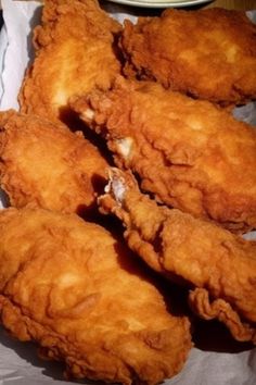 some fried food sitting on top of a piece of paper