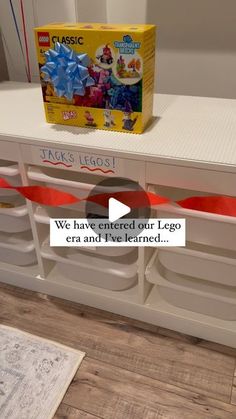 a lego box sitting on top of a white dresser