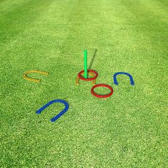 an image of the word olympics spelled out in the grass