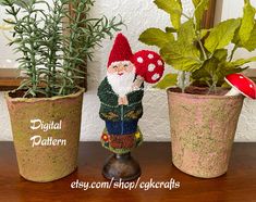 three potted plants with gnomes on them and the words digital pattern next to them