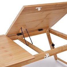 a wooden folding table with an open lid