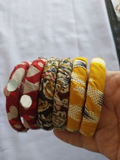 Handmade fabric bangles. 3 pair of various colours. Size 2.6 Fabric Bangles, The Bangles, Bangles Set, Handmade Fabric, Bangle Set, Bangle Bracelets, Jewelry Bracelets, Etsy Accessories, Handmade Items