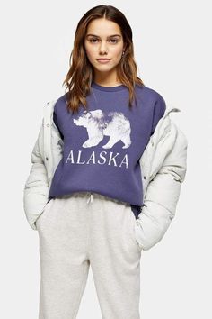 Topshop PETITE Blue Alaska Bear Sweatshirt | classic blue sweatshirt with big bear and Alaska motif. States themed clothing. Cozy winter sweatshirt for petites, great for the ski lodge or cabin snow vacation | affiliate link | Topshop | #topshop #petitefashion #sweatshirt #alaska #winterfashion #winterstyle Cabin Snow, Snow Vacation, Bardot Style, Bear Sweatshirt, Batwing Top, T Shirt Crop Top, Bear Outfits, Ski Lodge