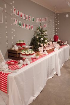 the table is set up for a christmas party