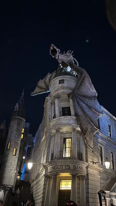 a building with a statue on top of it