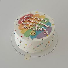 a birthday cake that has been decorated with confetti