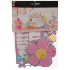 a package of happy birthday decorations with flowers on the front and back of each piece