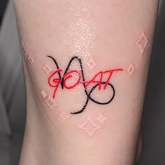 Red and black ink small capricorn tattoo Pisces And Capricorn Tattoo Combined, Capricorn Hand Tattoos For Women, Capricorn Wrist Tattoo, Red Capricorn Tattoo, Capricorn And Leo Tattoo Combined, Born With Horns Tattoo, Cute Capricorn Tattoo, Capricorn Aesthetic Tattoo, Seagoat Tattoo