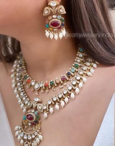 Reviving the royal time of luxurious lifestyle handcrafted in modern style.  Long multilayer necklace is always trending design lets wear it with some twist play with colors and beads  Gold plated and silver on high quality brass as base metal. Made in navratna. Victorian and gold plated  Moissanite polki kundan semiprecious stone  The majestically handcrafted Navratan Polki layered necklace set is based on gold plating that celebrates the rich heritage of Indian jewelry. The Indian Polki neckla Navratan Jewellery, Elegant Kundan Necklace With Meenakari And American Diamond, Navratan Necklace, Elegant Blue Kundan Necklace With Meenakari, Festive Gold-plated Kundan Necklace With Meenakari, Traditional Festive Kundan Necklace With Multi-stones, Formal Gold-plated Kundan Necklace With Meenakari, Victorian Jewelry Necklace, Sabyasachi Jewellery