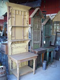 an assortment of wooden furniture in a garage