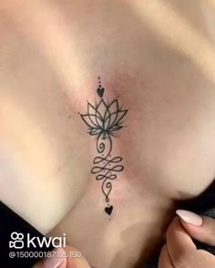 a woman with a tattoo on her chest