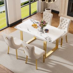 a dining room table with white chairs and flowers on it in front of a fireplace