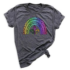 Elevate your style with our Grass Rainbow T-Shirt – a perfect blend of nature and vibrant hues. Adorned with a rainbow inspired by lush greenery, this tee is more than just clothing; it's a wearable celebration of natural beauty. Let your shirt be a canvas of color, adding a touch of fresh, vibrant charm to your everyday look. Embrace the beauty of the outdoors with our Grass Rainbow T-Shirt! Soft style Solid color: 100% Airlume combed and ring-spun cotton Heather Colors: 52% Airlume Combed and ring-spun cotton, 48% polyester Heather Sport colors: 60/40 polyester/cotton 100% No Sweatshops & Eco-Friendly Production *Product contents vary according to brands, this information shows average values.*Please check the size guide and color chart before purchasing a product. Casual Green Tops With Rainbow Print, Rainbow Print Graphic Tee For Pride, Graphic Tee With Rainbow Print For Pride, Rainbow Graphic Tee For Pride, Rainbow Colored Pre-shrunk Short Sleeve T-shirt, Rainbow Short Sleeve Top For Pride, Casual Rainbow T-shirt With Relaxed Fit, Rainbow Graphic Tee With Short Sleeves, Pre-shrunk Rainbow Graphic Tee