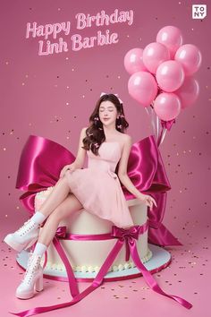 a woman sitting on top of a cake with balloons in front of her and the caption happy birthday linh barbie