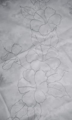 a drawing of flowers on a white sheet