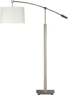 a floor lamp with a white shade on the base and a black metal pole underneath it