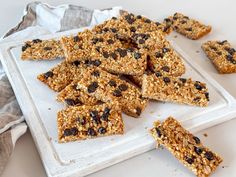 granola bars are arranged on a white tray