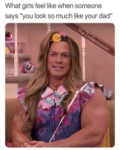 a man with long hair wearing a flower in his hair, and the caption reads, what girls like when someone says you look so much like your dad