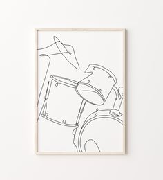 a black and white drawing of a drum set in front of a wall mounted art piece