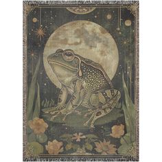 a tapestry with a frog sitting on the ground in front of a full moon and flowers