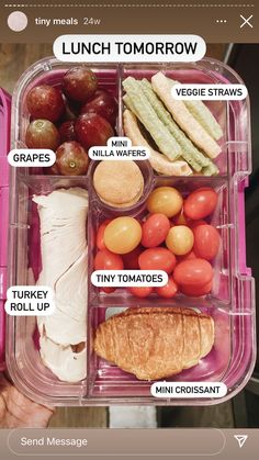 a pink lunch box filled with different types of food and words on the lid that read lunch tomorrow