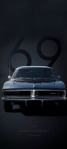 an old dodge charger car on a black background