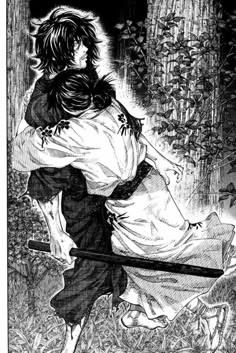 an image of a man and woman hugging in the woods, with one holding on to another