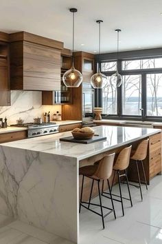 a large kitchen with marble counter tops and wooden cabinetry, along with bar stools