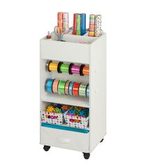 a white cart with many different colored spools on it