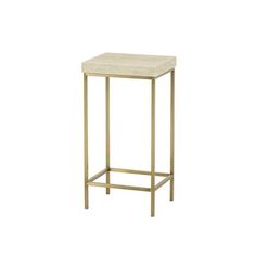 a gold metal and marble side table with a square top on an isolated white background