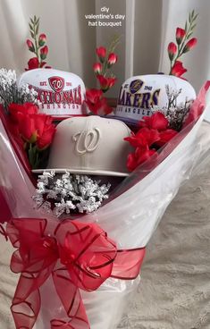 a baseball hat and flowers in a basket